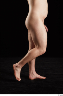 Torin  1 calf flexing nude side view 0001.jpg